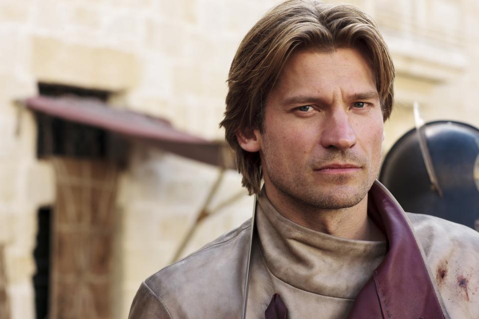 Before you ask — it does seem like Jaime Lannister and his sister Cersei were crushed to death in the penultimate episode, but since no one actually <em>saw</em> them die, there are some conspiracy theorists who think they're still around. So just in case, we're including them in our list of surviving characters. Note again how blond Jaime is when <strong>Nikolaj Coster-Waldau</strong> first shows up in Season 1. He's clean-shaven, and his hair is clean, bouncy, and just <em>begging</em> to be swept out of his eyes with an arrogant flick of the wrist. And the colors he's wearing? Lannister gold and crimson all over.