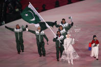 <p>Flag bearer Muhammad Karim of Pakistan leads the team during the Opening Ceremony of the PyeongChang 2018 Winter Olympic Games at PyeongChang Olympic Stadium on February 9, 2018 in Pyeongchang-gun, South Korea. (Photo by Ronald Martinez/Getty Images) </p>