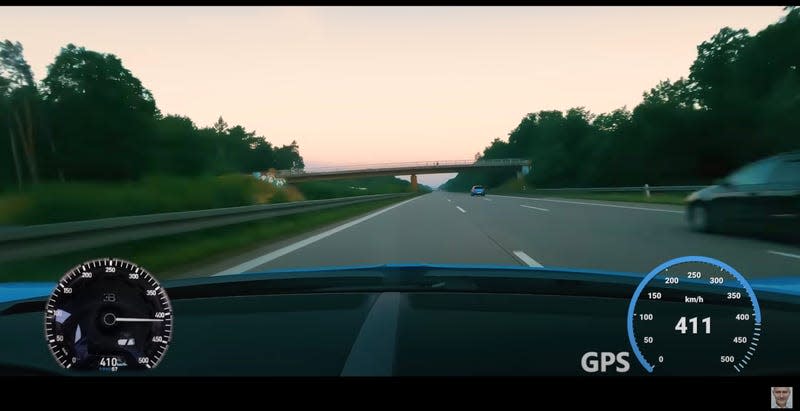 The view out of the windshield of a Bugatti Chiron traveling 411 kph on the German Autobahn.
