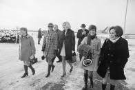 The five young women that attended the party on Chappaquiddick Island the night Mary Jo Kopechne was killed return to airport terminal from plane after trouble cropped up with the plane, Edgartown, Mass., Jan. 8, 1970. Earlier in the day they had testified in fourth and last day of inquest into death of Miss Kopechne involving Sen. Edward Kennedy. (L-R) Rosemary Keough, Maryellen Lyons, Nance Lyons, Susan Tannenbaum and Esther Newberg. Behind-right is one of the lawyers, Daniel Daly. (Photo: Bettmann/Getty Images)