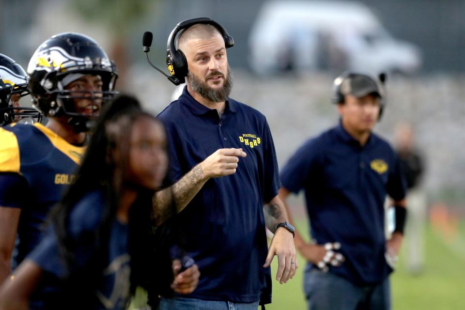 Desert Hot Springs High football head coach Roy Provost watches the defense against Jurupa Valley in Desert Hot Springs, Calif., on August 25, 2023.