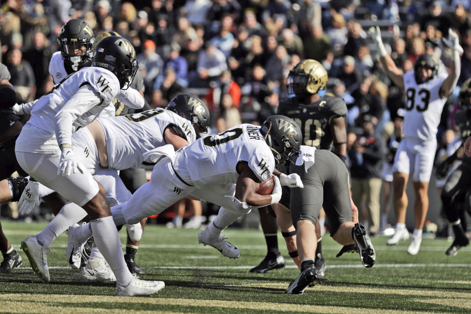 Wake Forest running back Christian Turner (0) scores a touchdown against Army during the first half of an NCAA college football game Saturday, Oct. 23, 2021, in West Point, N.Y. (AP Photo/Adam Hunger)