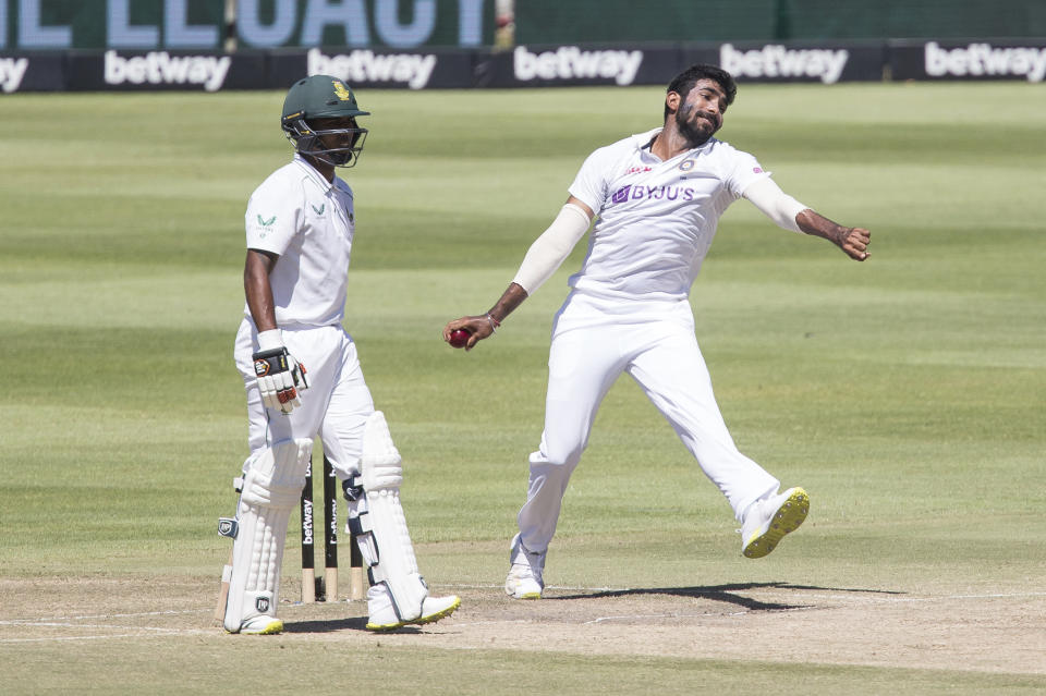 Indian bowler Jasprit Bumrah bowls while South African batsman Keegan Peterson looks on during the fourth day of the third and final test match between South Africa and India in Cape Town, South Africa, Friday, Jan. 14, 2022. (AP Photo/Halden Krog)