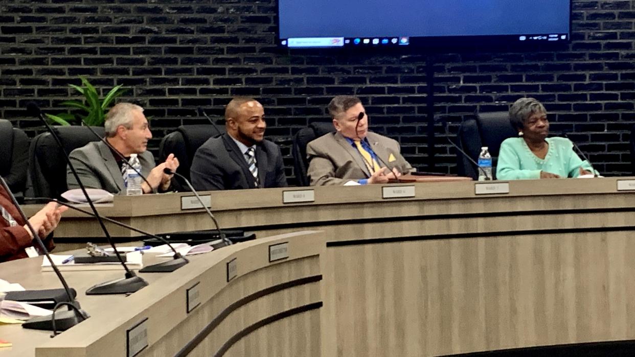 Canton Ward 6 Councilman Kevin Hall listens as council members wish him well in his bid for Stark County commissioner. Ward 8 Councilman Richard Sacco sits to Hall's left and Ward 5 Councilman Robert Fisher and Ward 4 Councilwoman Chris Smith sit to the right.