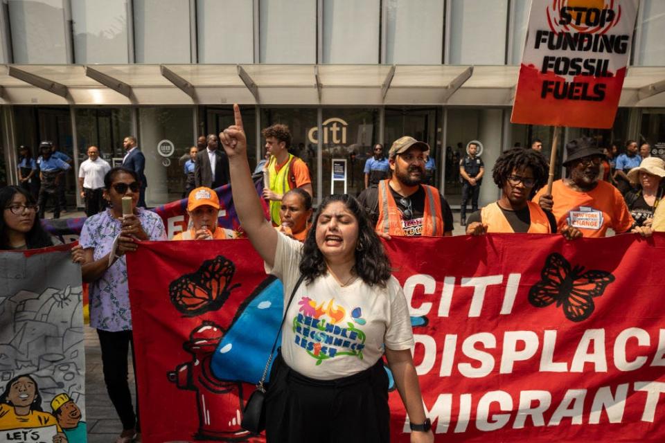 Climate activists blocked the entrance of Citibank headquarters during a protest on August 16, 2024 in New York.