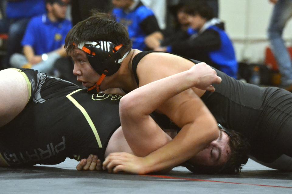 Aztec High School's 215-pounder Jaylen Ignacio working to pin Pagosa Springs' Conner Kelly in their first-place showdown at the Butch Melton Invitational, Saturday, Jan. 28, 2023 at Ignacio High School.