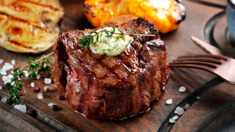 filet mignon steak on cutting board