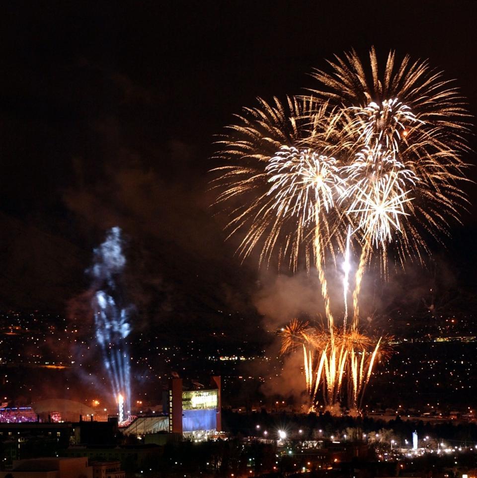 Fireworks explode over the University of Utah’s Rice-Eccles Stadium during the opening ceremony of the 2002 Winter Games in Salt lake City on Feb. 8, 2002. | Peter Chudleigh, Deseret News