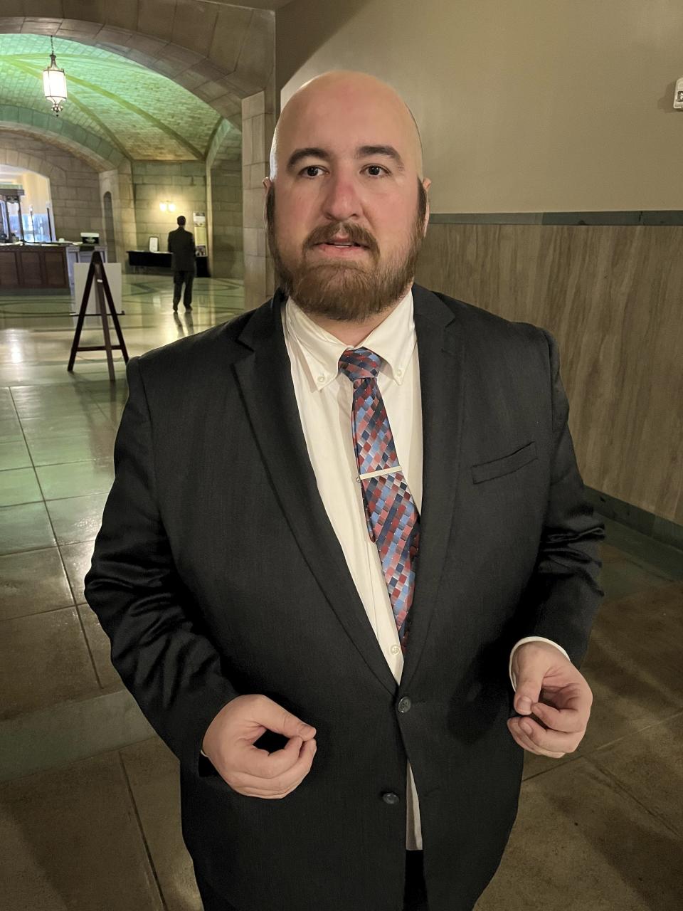 Dunixi Guereca, executive director of the Nebraska-based public schools advocacy group Stand For Schools, explains his opposition to a Nebraska bill that would allow teachers and school staff to physically restrain disruptive students and remove them from classrooms without fear of facing professional discipline, Tuesday, Feb. 28, 2023, in Lincoln, Neb. Critics say physical restraint has been used disproportionately against minority and disabled students. Guereca believes the bill is worded so vaguely as to shield teachers who physically restrain students from legal liability. (AP Photo/Margery A. Beck)