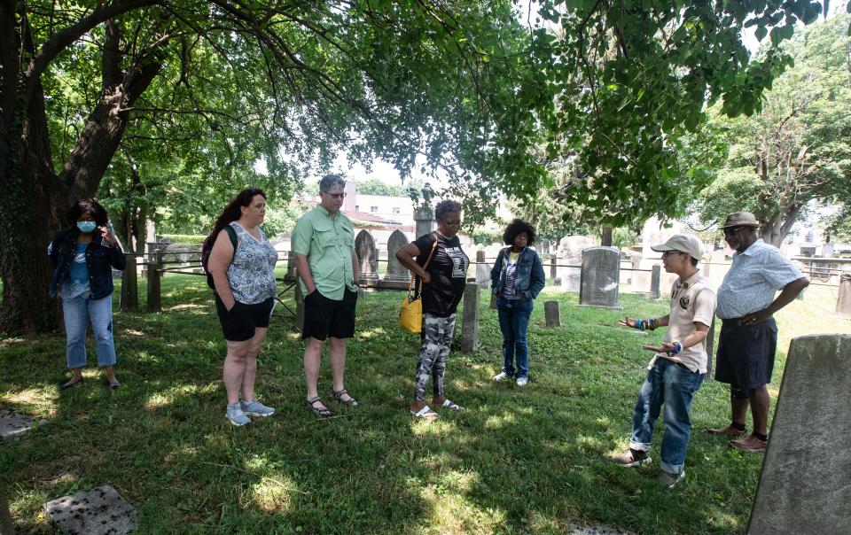 Volunteer Bryan Santiago gives a tour of the Revolutionary War era cemetery at St. PaulÕs Church National Historic Site in Mount Vernon during ÒA Celebration of JuneteenthÓ at June 19, 2023. The ceremony included performances by bass baritone singer Ronald Campbell, flutist Eric Howard, the gospel choir of the Greater Centennial A.M.E. Zion Church in Mount Vernon, an address by Mount Vernon Mayor Shawyn Patterson-Howard, and the reading of the original proclamation declaring the end of slavery in Texas. Juneteenth is the federal holiday commemorating the emancipation of enslaved African Americans. 