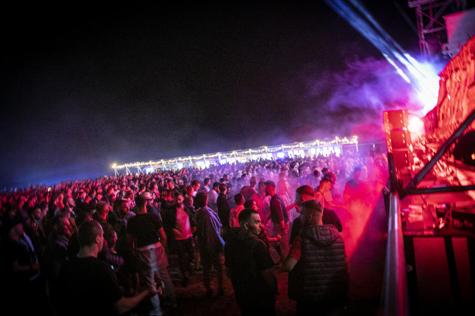 People gather during the Unum Festival at Rana e Hedhun beach on June 6, 2021 in Shengjin, Albania.