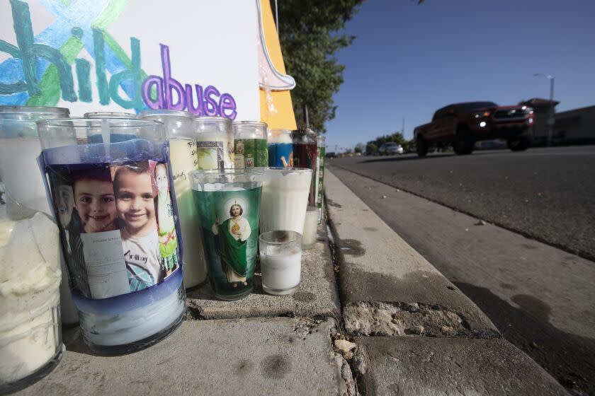 LANCASTER, CALIF. -- FRIDAY, JUNE 29, 2018: A memorial shrine for murdered 10-year-old Anthony Avalos, is assembled on a sidewalk near Avalos' home on Challenger Way near Ave. K in Lancaster, Calif., on June 29, 2018. Anthony's mother and her boyfriend have been arrested in connection with his death. (Brian van der Brug / Los Angeles Times)