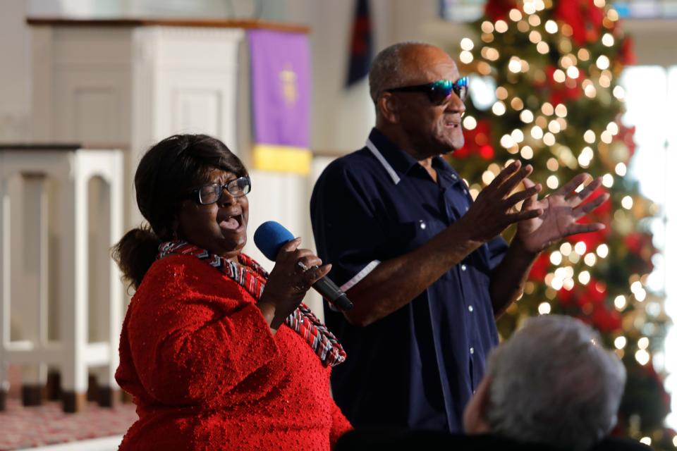 Attendees of the 31st annual Christmas Carol Sing at First Presbyterian Church of Fort Myers sing hymns on Tuesday, Dec. 6, 2022. The event benefits the Community Cooperative, a local organization that helps feed the hungry.