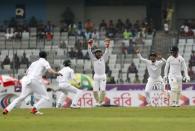 Cricket - Bangladesh v England - Second Test cricket match - Sher-e-Bangla Stadium, Dhaka, Bangladesh - 28/10/16. Bangladesh's players successfully appeal for the wicket of England's Ben Duckett. REUTERS/Mohammad Ponir Hossain