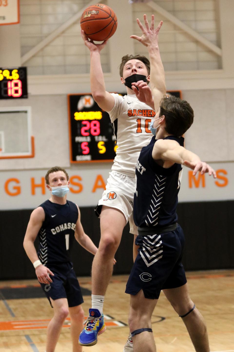 Jacob Briggs drives down the lane Tuesday night against Cohasset. 