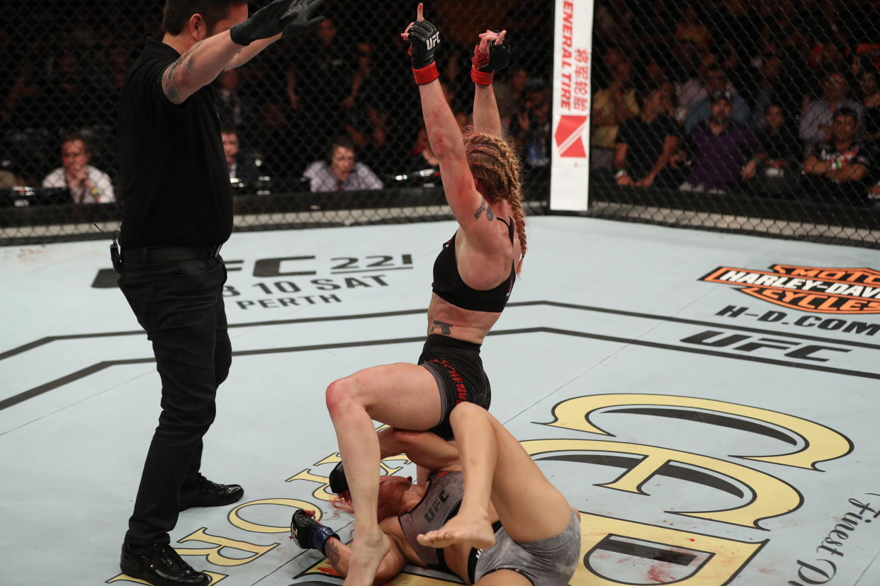 Valentina Shevchenko celebrates her submission of Priscilla Cachoeira Saturday in Belem, Brazil, as referee Mario Yamasaki waves it off. Yamasaki let the one-sided bout go dangerously long. (Getty Images)