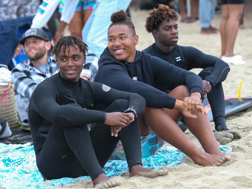 Surfers at A Great Day in the Stoke