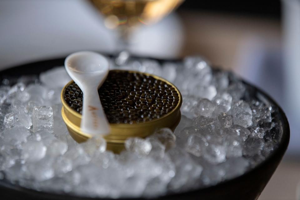 50g Caviar served with sour cream & onion doughnuts at Locust in Nashville, Tenn., Friday, Sept. 15, 2023.