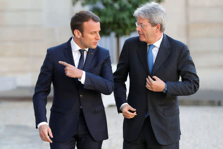 French President Emmanuel Macron meets Italian Prime Minister Paolo Gentiloni at the Elysee Palace in Paris, France May 21, 2017. REUTERS/Philippe Wojazer