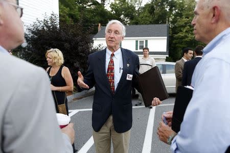 U.S. Senate candidate Jim Rubens (R-NH) speaks with local citizens before a town meeting in Windham, New Hampshire, August 5, 2014. Picture taken August 5, 2014. REUTERS/Dominick Reuter