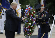 <p>President Donald Trump lays a wreath at the Tomb of the Unknown Solider at Arlington National Cemetery, Monday, May 28, 2018, in Arlington, Va. (Photo:Evan Vucci/AP) </p>