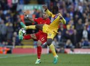 Britain Football Soccer - Liverpool v Crystal Palace - Premier League - Anfield - 23/4/17 Crystal Palace's Jeffrey Schlupp in action with Liverpool's Roberto Firmino Reuters / Phil Noble Livepic