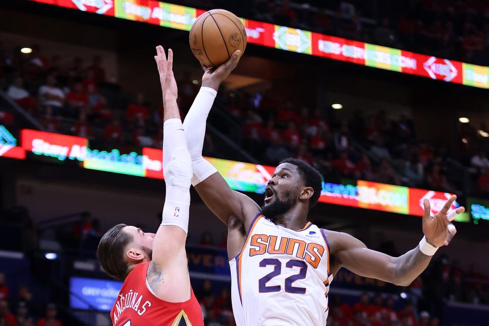 Deandre Ayton #22 of the Phoenix Suns shoots the ball against Jonas Valanciunas #17 of the New Orleans Pelicans during the first half of Game Three of the Western Conference First Round game at the Smoothie King Center on April 22, 2022 in New Orleans, Louisiana.