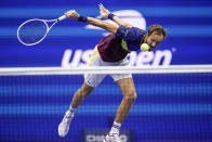 Daniil Medvedev, of Russia, returns a shot to Carlos Alcaraz, of Spain, during the men's singles semifinals of the U.S. Open tennis championships, Friday, Sept. 8, 2023, in New York. (AP Photo/Charles Krupa)