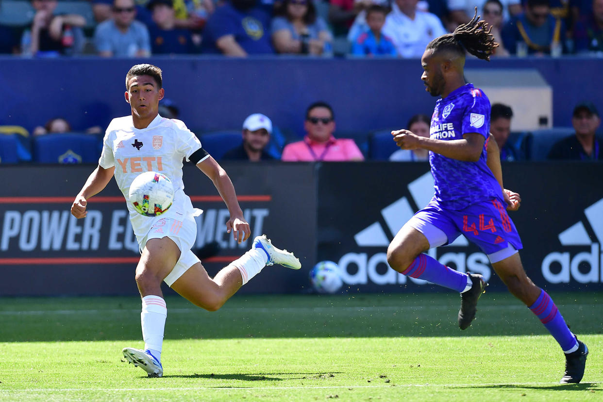 Austin FC midfielder Owen Wolff, left, moves the ball ahead of Los Angeles Galaxy forward Raheem Edwards during El Tree's 4-1 loss Sunday.