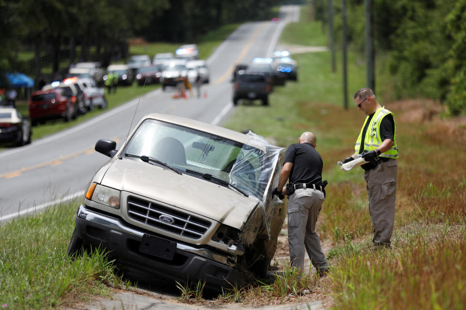 Florida Highway Patrol officers work on a vehicle believed to be involved in an accident with a bus near Dunnellon, Florida, May 14, 2024. / Credit: Reuters/Octavio Jones