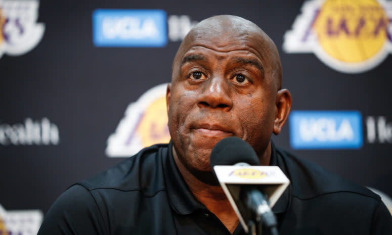 A closeup of Los Angeles Lakers great Magic Johnson addressing the media.