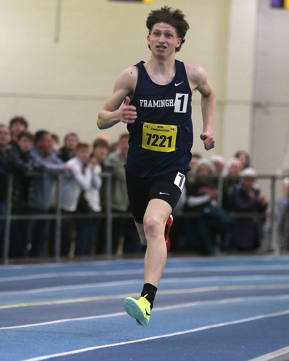 Framingham’s Sam Burgess takes first place in the two mile with a time of 8:59.27 at the MIAA Meet of Champions at the Reggie Lewis Track Center in Boston on Saturday, Feb. 25, 2023.