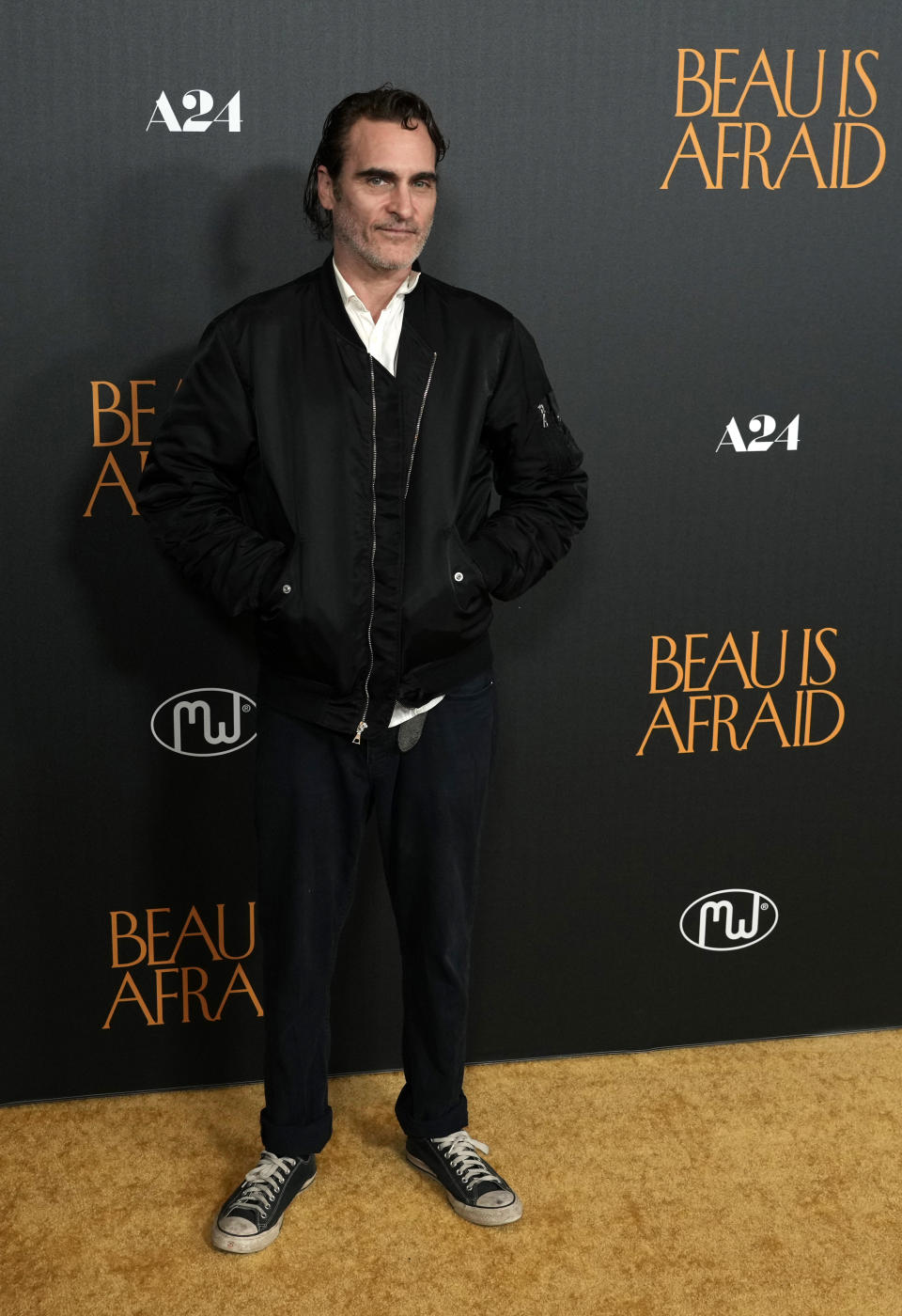 Joaquin Phoenix, star of "Beau Is Afraid," poses at the premiere of the film, Monday, April 10, 2023, at the Directors Guild of America in Los Angeles. (AP Photo/Chris Pizzello)