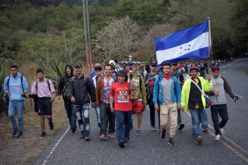 Hondurans take part in a caravan of migrants heading toward the U.S., in Chiquimula