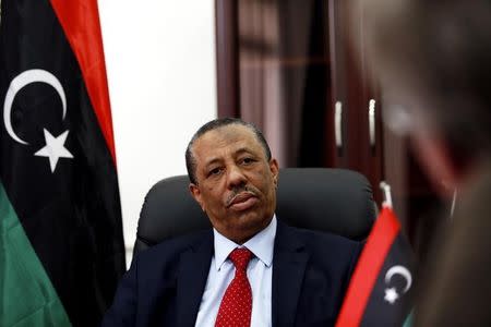 Libya's internationally recognized Prime Minister Abdullah al-Thinni speaks during an interview with Reuters in Bayda February 15, 2015. REUTERS/Esam Omran Al-Fetori