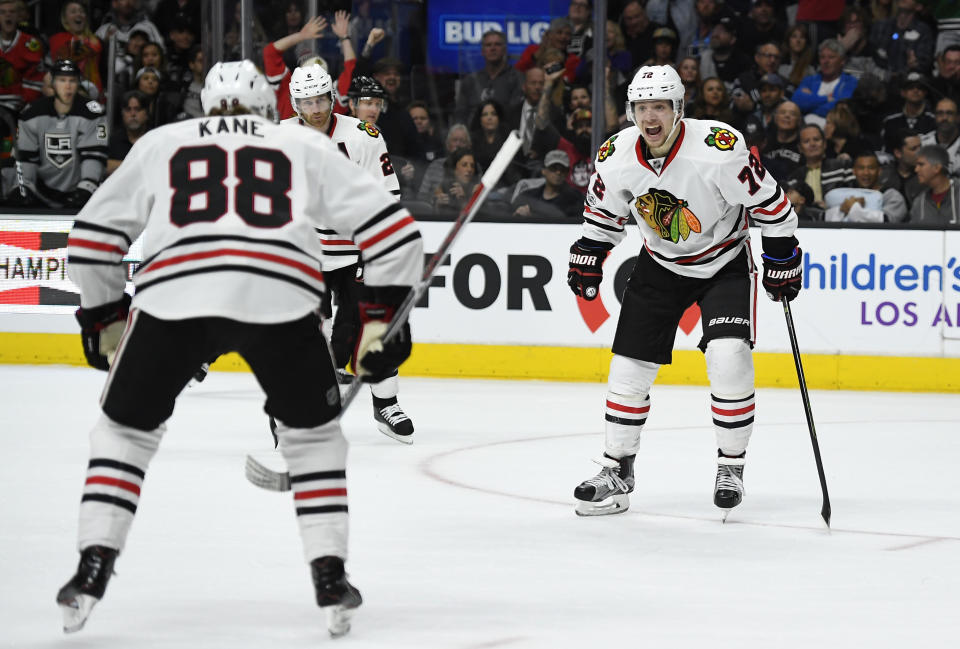 Chicago Blackhawks left wing Artemi Panarin, right, of Russia, celebrates his goal with right wing Patrick Kane during the third period of the team's NHL hockey game against the Los Angeles Kings, Saturday, April 8, 2017, in Los Angeles. The Kings won 3-2 in overtime. (AP Photo/Mark J. Terrill)