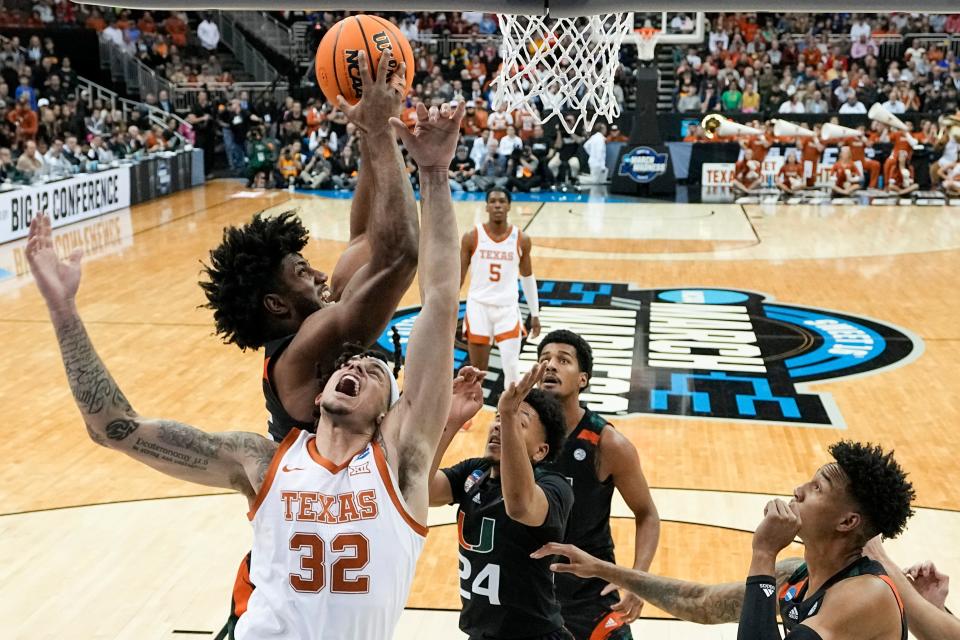 Miami forward Norchad Omier shoots over Texas' Christian Bishop during the first half of Sunday's 88-81 Hurricanes win in the Elite Eight of the NCAA Tournament at T-Mobile Center in Kansas City, Mo. The Hurricanes will join UConn, Florida Atlantic and San Diego State in the Final Four.