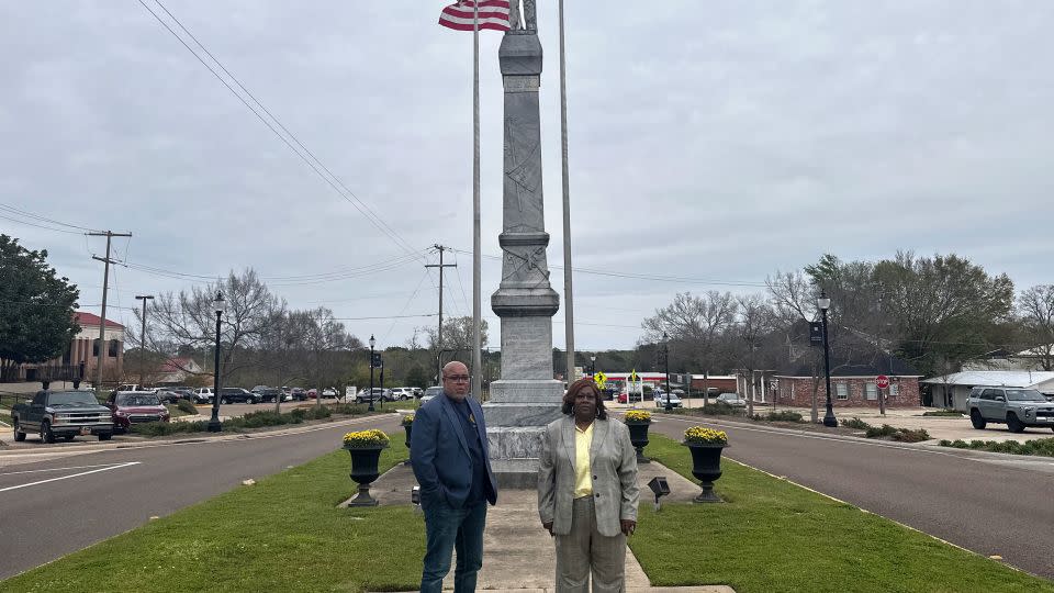 Will Sims, left, and Angela English stand March 21 in front of a Confederate monument in Brandon. - Emma Tucker/CNN