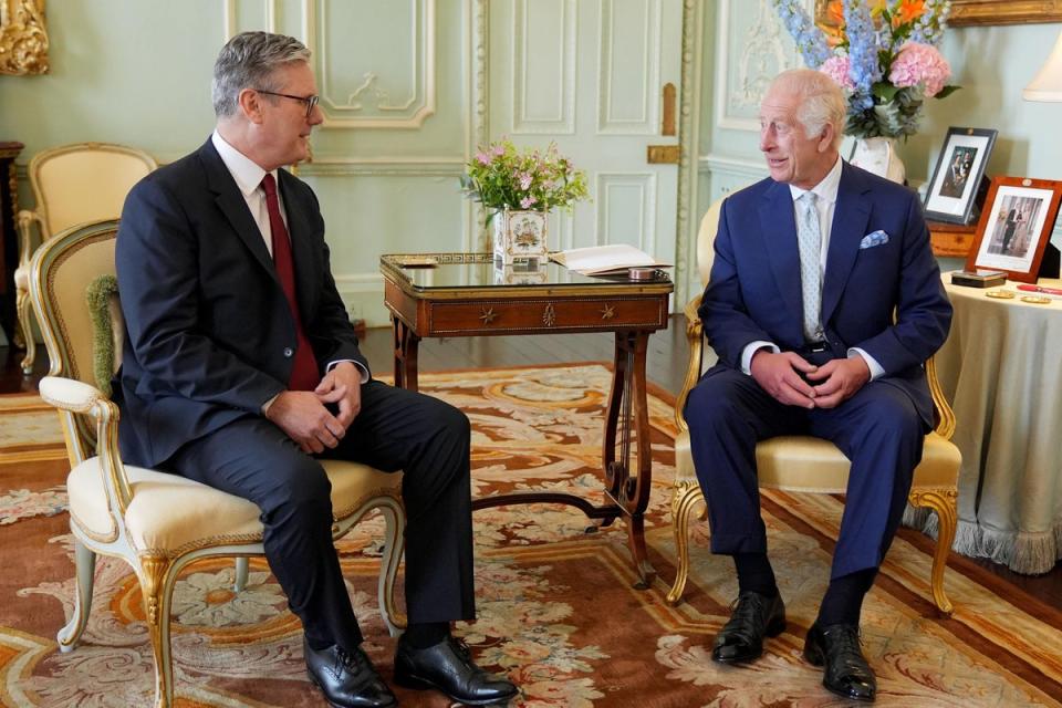 King Charles III speaks with Sir Keir Starmer during an audience at Buckingham Palace (PA Wire)
