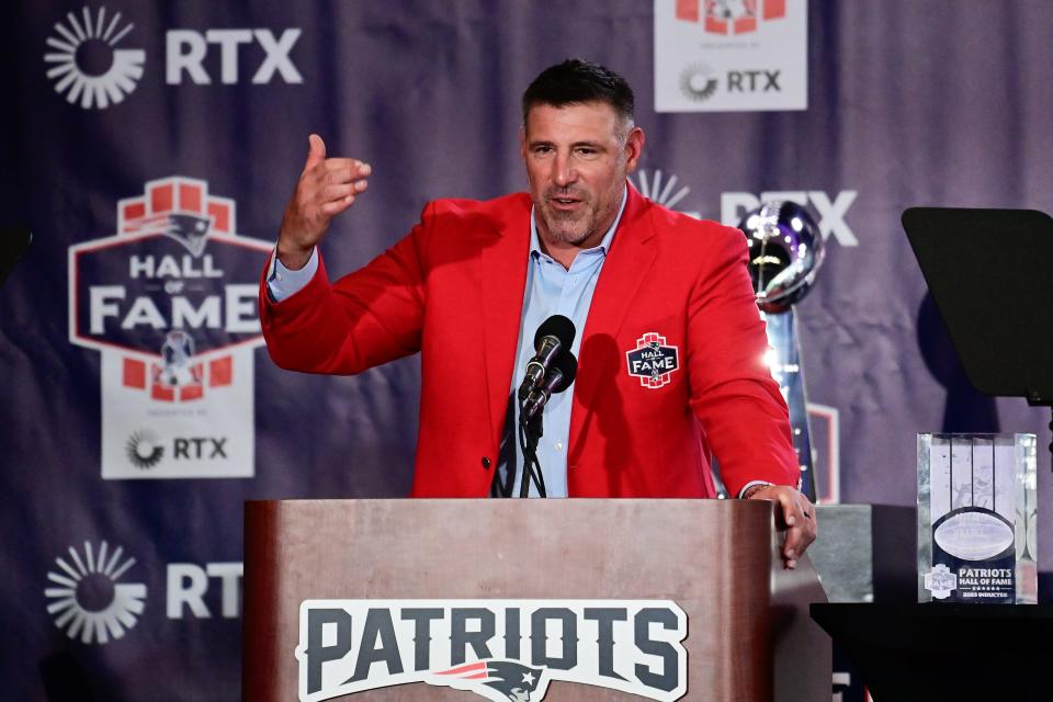 Former New England Patriots linebacker Mike Vrabel makes a speech at his 2023 Patriots Hall of Fame induction in the Cross Insurance Pavilion at Gillette Stadium.