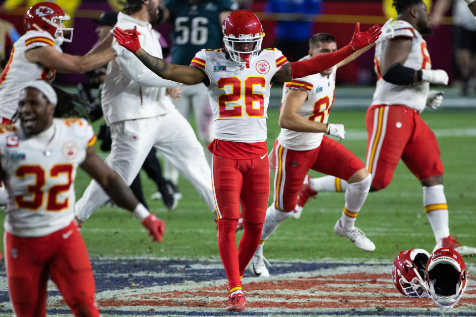 Feb 12, 2023; Glendale, Arizona, US; Kansas City Chiefs safety Deon Bush (26) celebrates a Super Bowl LVII victory against the Philadelphia Eagles at State Farm Stadium. Mandatory Credit: Bill Streicher-USA TODAY Sports