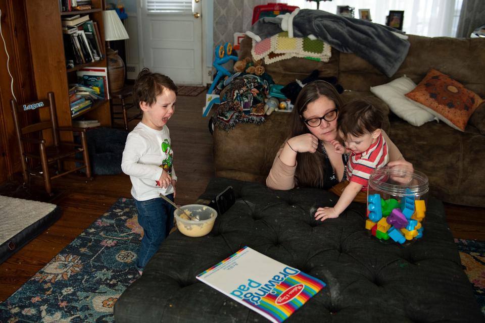 Katherine Hart's older son who is 3 years old, becomes upset while playing with his mother and brother at their home in Medford Lakes, NJ.