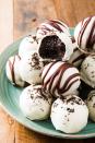 <p>These little guys are about as no-fuss as a dessert can be!</p><p>Get the <a href="https://www.delish.com/uk/cooking/recipes/a30377008/oreo-truffles-recipe/" rel="nofollow noopener" target="_blank" data-ylk="slk:Oreo Truffles;elm:context_link;itc:0;sec:content-canvas" class="link ">Oreo Truffles</a> recipe.</p>