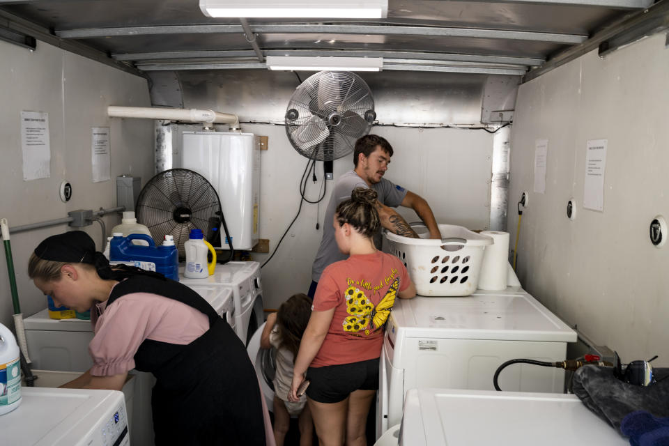 Image: Inside the laundry truck in downtown Buckhorn, Ky., on Aug. 19, 2022. (Michael Swensen for NBC News)