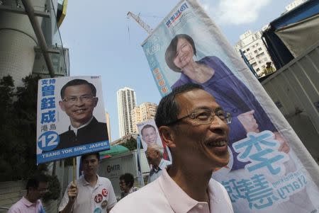 Jasper Tsang Yok-sing, candidate from the pro-Beijing "Democratic Alliance for the Betterment and Progress of Hong Kong" (DAB), campaigns on election day for the Legislative Council in Hong Kong, in this September 9, 2012 file picture. REUTERS/Tyrone Siu/Files