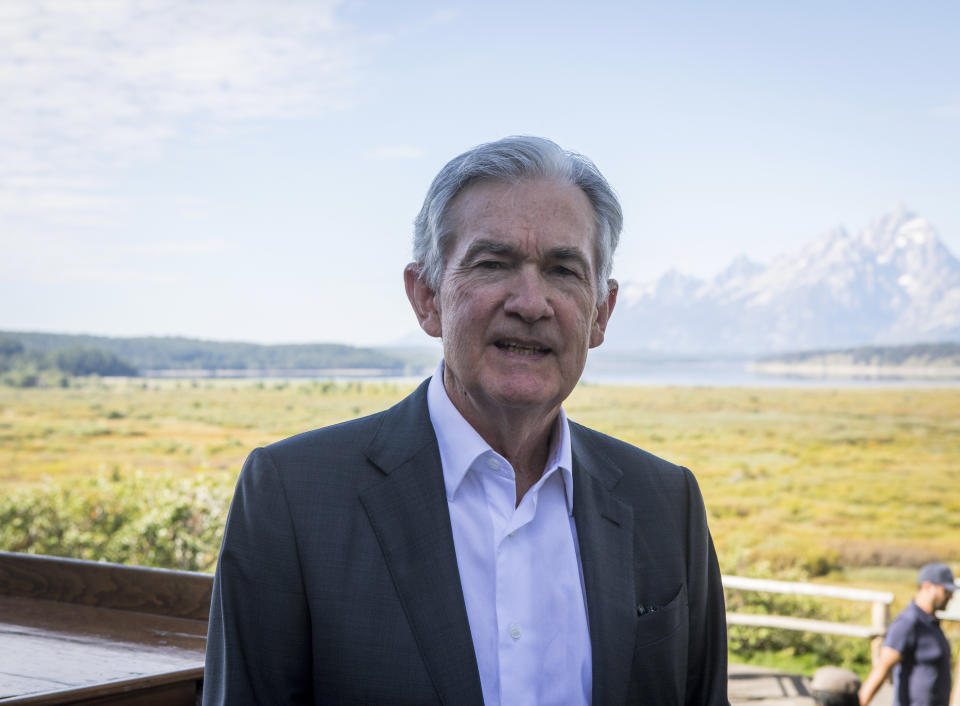 Federal Reserve Chairman Jerome Powell takes a break outside of Jackson Lake Lodge during the Jackson Hole Economic Symposium near Moran in Grand Teton National Park, Wyo., Friday, Aug. 25, 2023. (AP Photo/Amber Baesler)