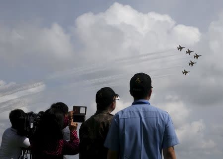 South Korea's Black Eagles aerobatics team perform a maneuver during a preview of the Singapore Airshow at Changi exhibition center in Singapore February 14, 2016. REUTERS/Edgar Su