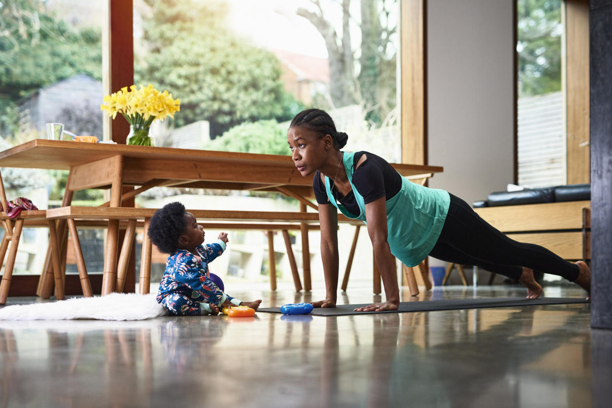 Woman exercising after giving birth. (Getty Images)