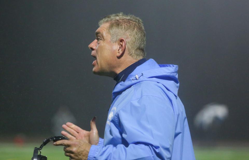 West Morris coach Kevin Hennelly on the sideline during the first half of a football game at West Morris Central High School on November 11, 2022.