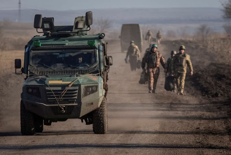 FILE PHOTO: Ukrainian servicemen are seen near the frontline near Soledar